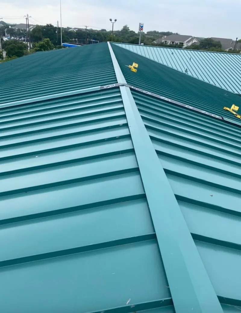Green commercial metal roof ridge and valley for Metal Roof Repair in Douglas